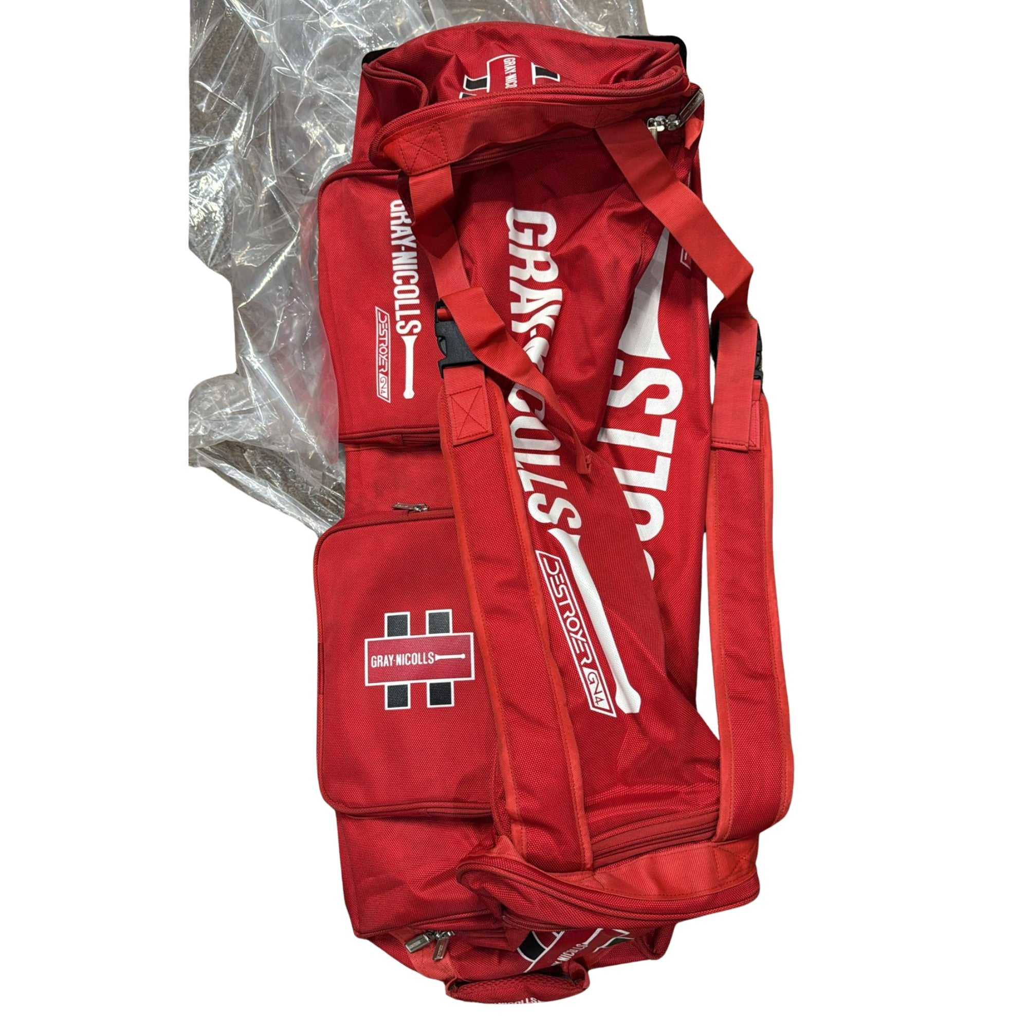 Red sports bag with visible branding on a white background