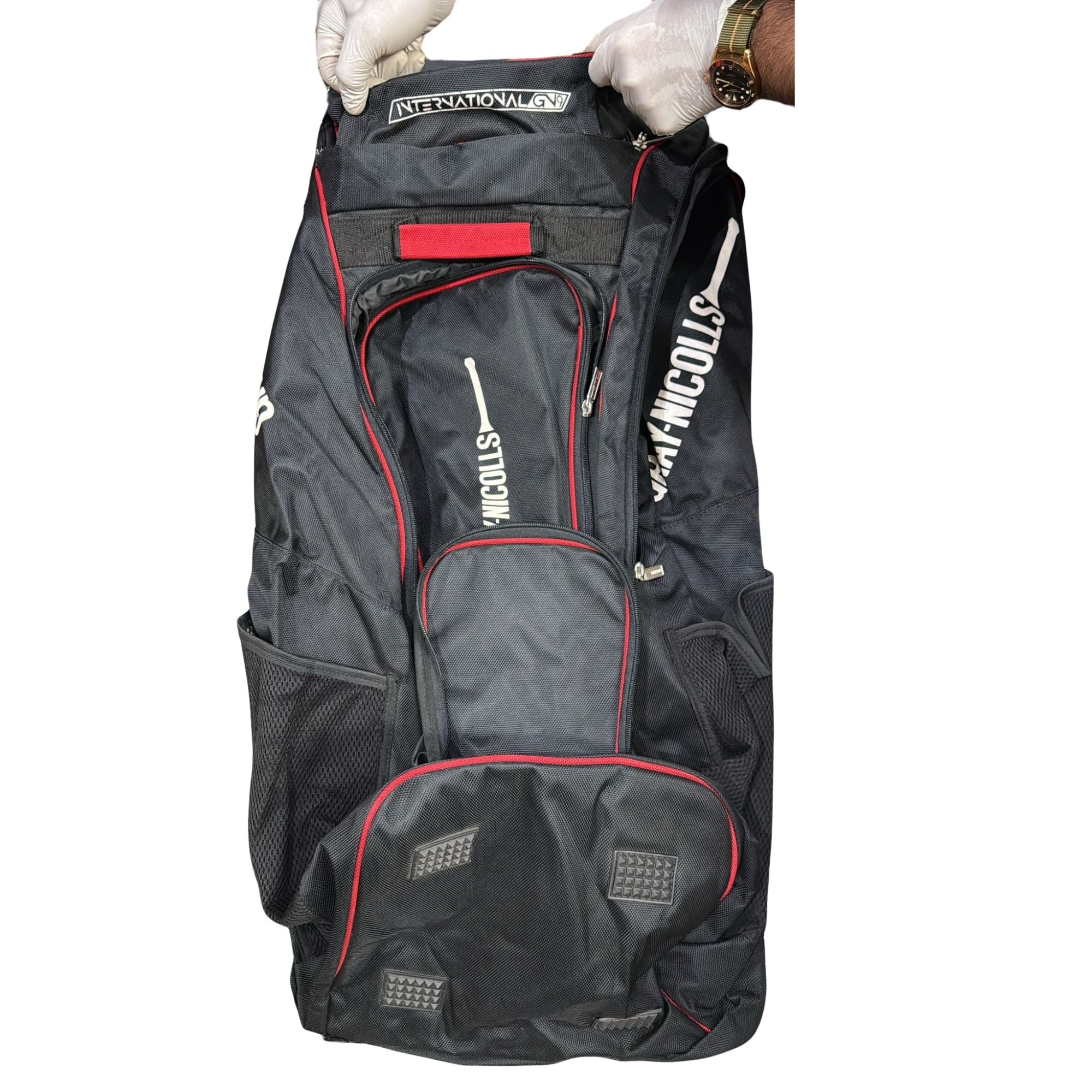 Black and red sports bag with 'Gray Nicolls' branding on a white background with red corners