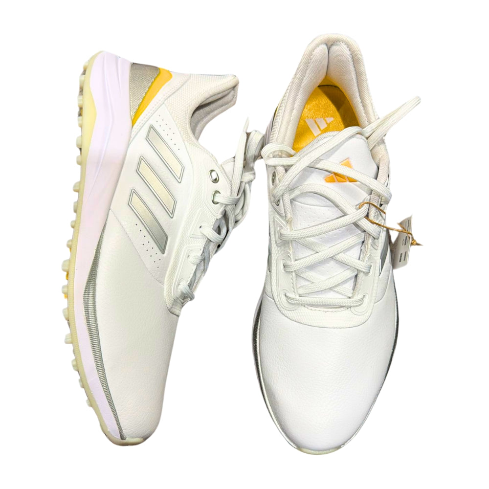 Close-up side and upper views of Adidas Cricket/Golf Light-strike shoes, showcasing the sleek design, eco-conscious materials, and lightweight construction for optimal performance and comfort.