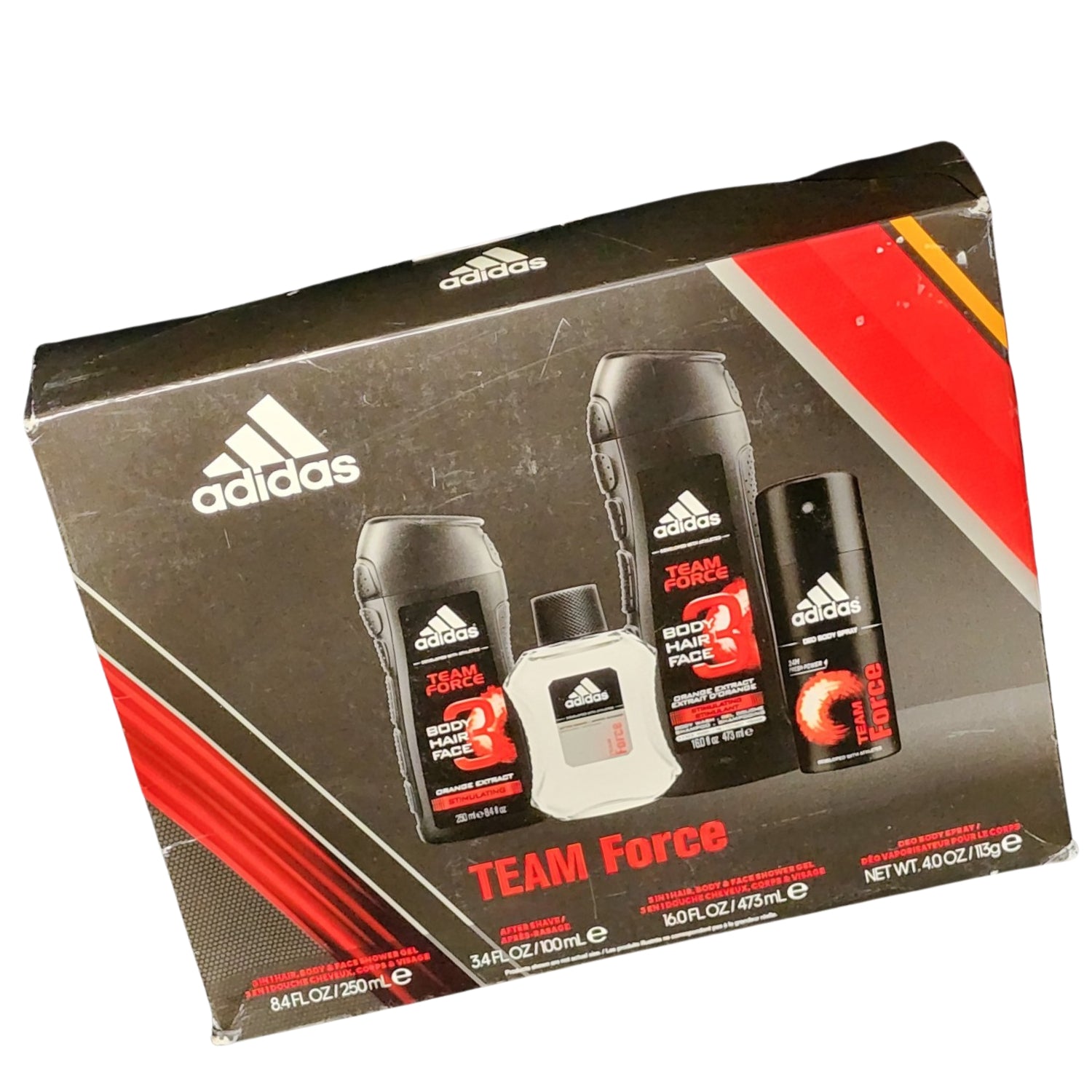 Angled front view of the Adidas Refresh Kit carton in red, highlighting the striking color, prominent Adidas logo, and modern packaging tailored for active lifestyles.