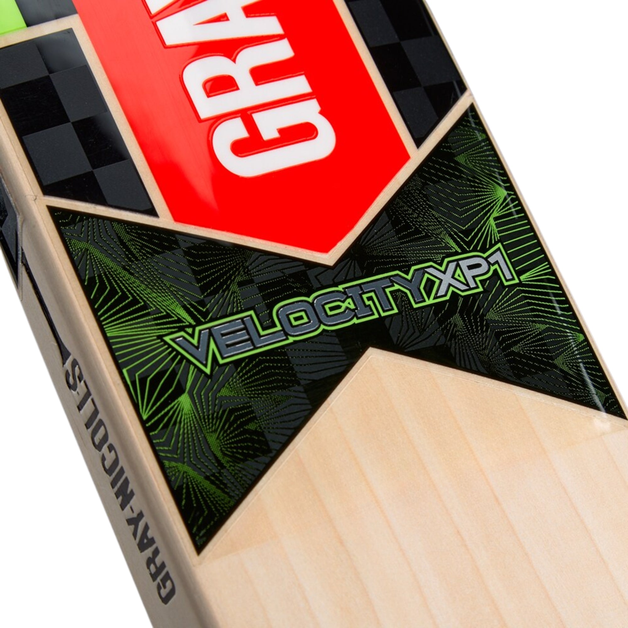 Close-up of a cricket bat with 'Gray nicolls' branding and 'Velocity XP1' text on a white background.