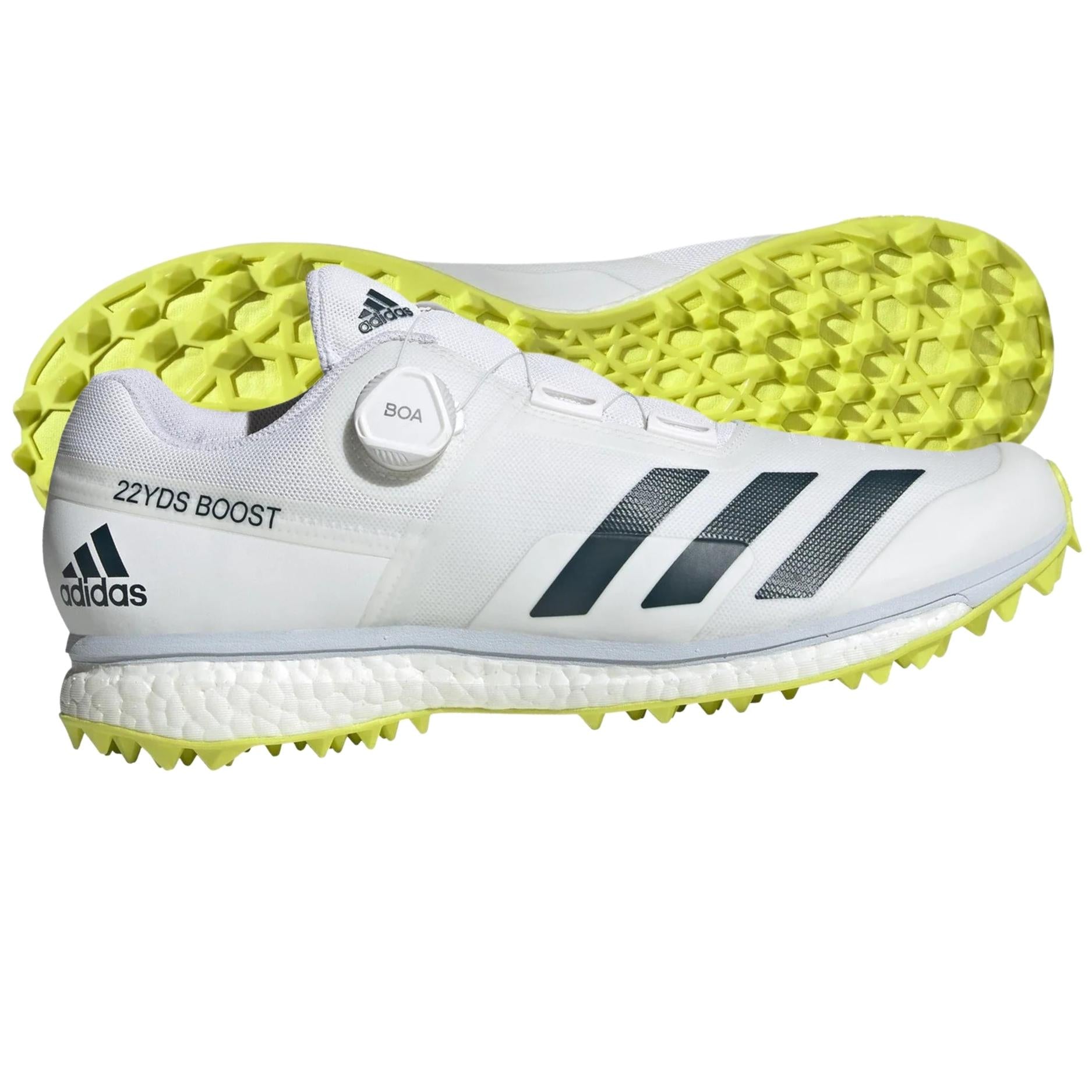 2nd-Bottom-and-Side-View Adidas 22YDS Boost Cricket Shoes shown from the bottom and side, highlighting the ultra-sharp TPU outsole with traction lugs and ergonomic design for optimal grip and stability.